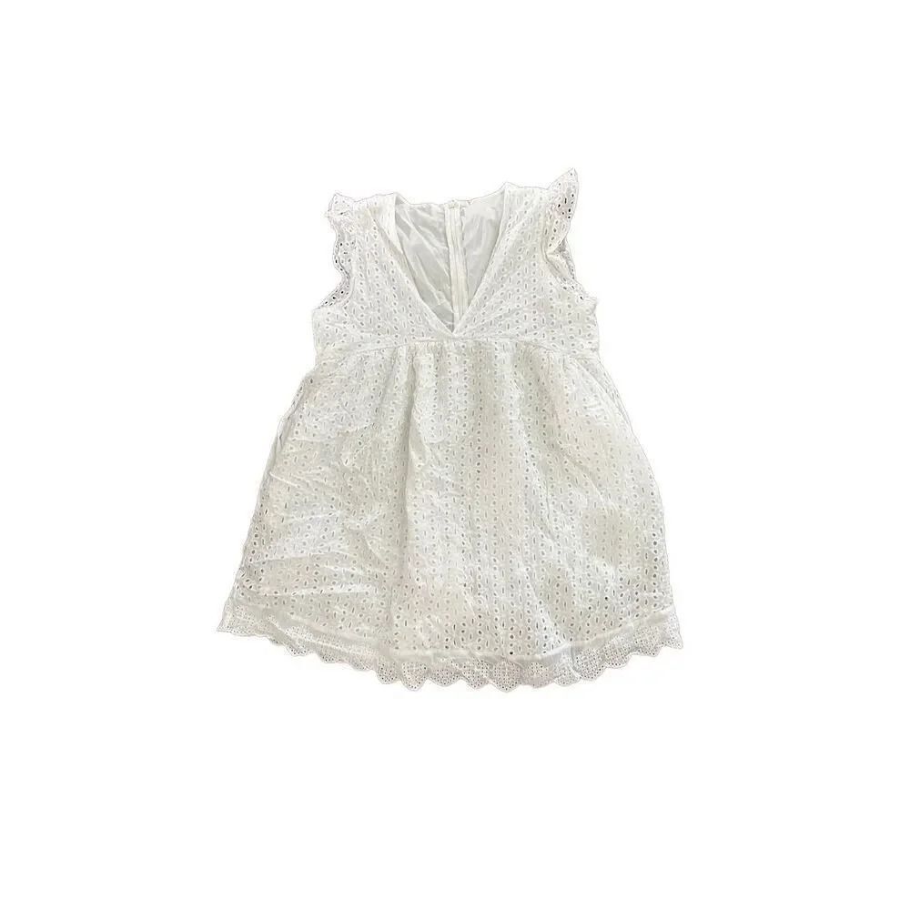 Unknown brand size small, eyelet, mini skirt with short slipped underneath